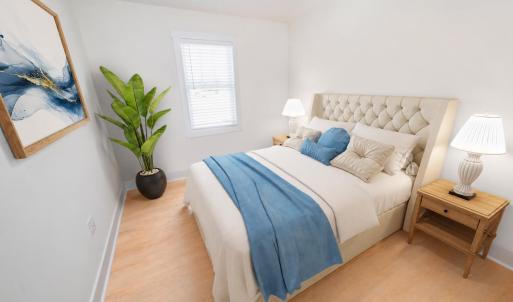 Two additional bedrooms upstairs. Similar to photos.