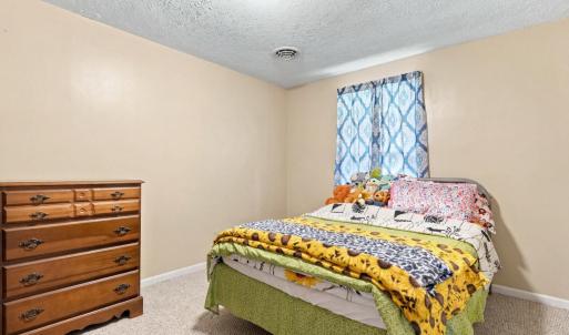 Unit A - Bedroom - pictured altered to remove personal belongings