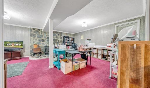 So many options! Perfect space for a den, great room, craft room, game room, or lower level apartment!