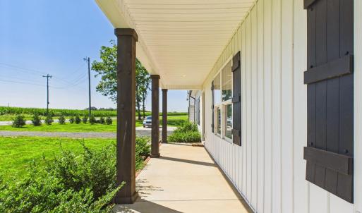 Covered Front Porch welcomes you home and creates the perfect place to relax and enjoy Country Living.