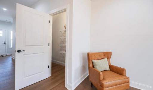 Main level, storage closet and pantry, located right off kitchen and living area.