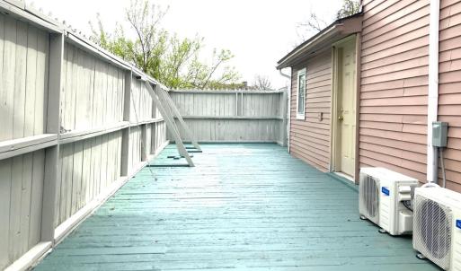 LARGE PRIVACY FENCED SIDE PORCH WITH BRAND NEW MINI SPLITS