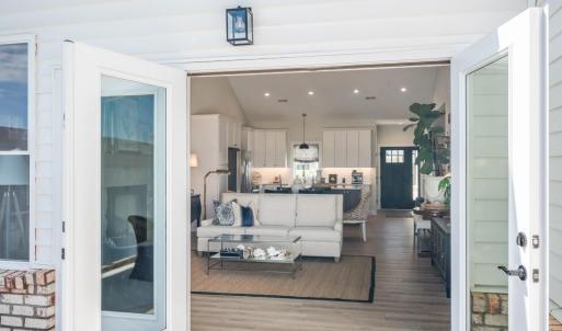 Double French doors that open in den to outdoor patio which gives full panoramic mountain views