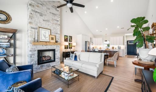 Inviting great room with vaulted ceilings, gas logs and beautiful mountain views