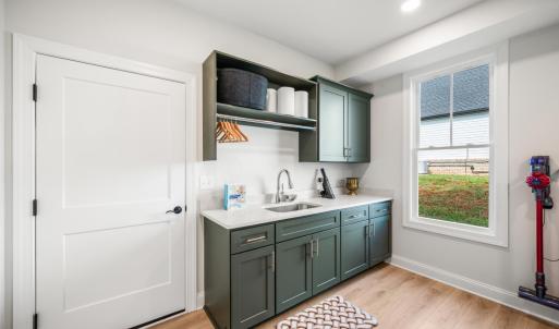 Main level oversized laundry room/mudroom