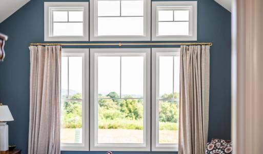 Custom window treatments and curtain rod. Beautiful!!!