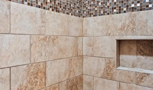 Walk in shower in Jack and Jill bathroom on main level.