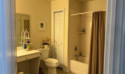 Bathroom #2 has a tile shower and tub, linen closet 2 access doors