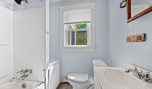 Full bath at the end of the hallway
