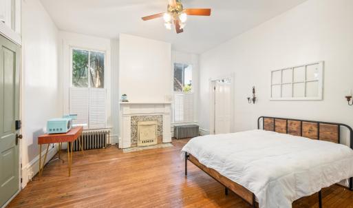 Main level bedroom/guest room with ensuite and private entrance.