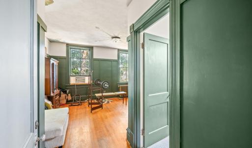 View from upstairs primary bedroom into office/nursery/etc.