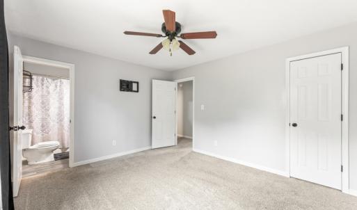 Primary bedroom with full bath