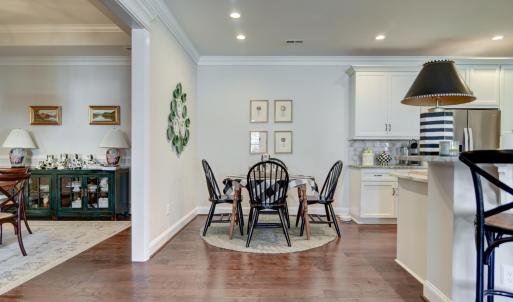 View from Great Room towards the formal Dining room (on the left) and Kitchen seating nook (straight ahead)