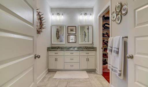 Primary Bedroom, dual sinks, walk-in closet, water closet, ceramic tile floors