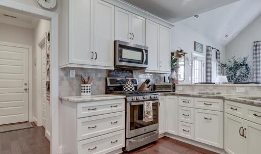 Kitchen work space, Gas Range, Microwave, Granite Countertops, Sink