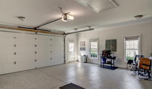 Large Garage with new Epoxy Floor and additional exterior door entry
