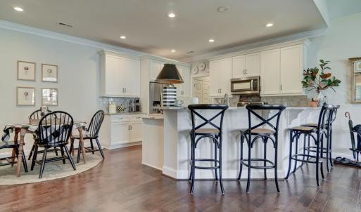 View from Fireplace towards, the Kitchen seating area, and Gourmet Kitchen
