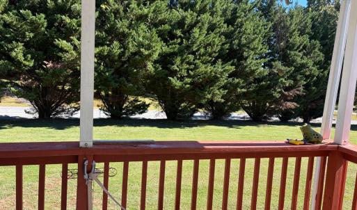 view from the front porch. trees block road so it's private