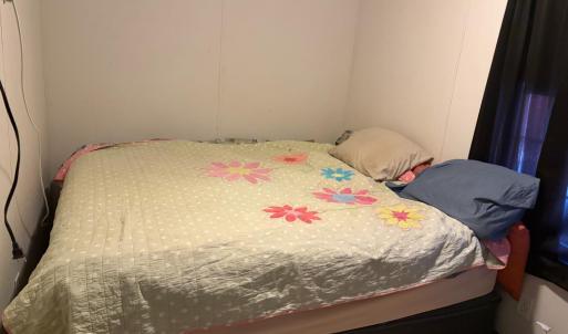 smaller back bedroom