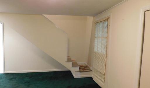 Primary view 2 showing staircase to two large room