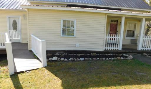 Front  showing new ramp and exterior entrance to a