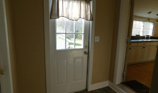 Back door foyer looking into kitchen
