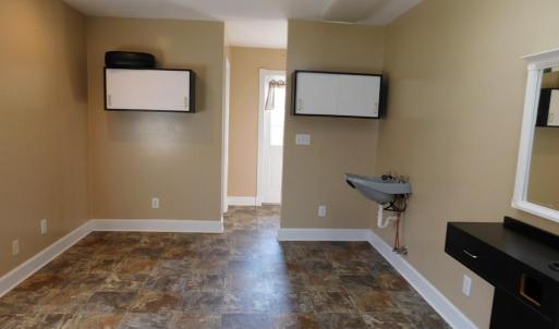 Additional room in new addition, half bath through