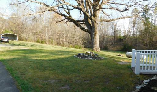 Front yard looking towards carport.