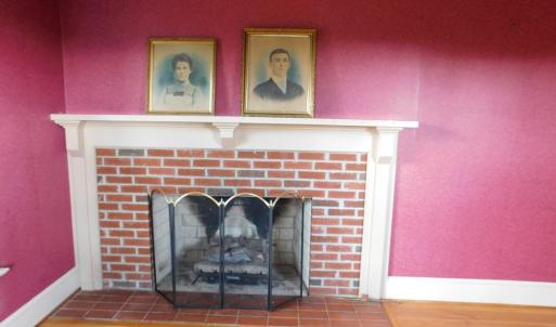 Living room view 3 of brick fireplace