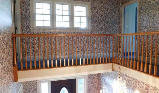View of upstairs hallway.
