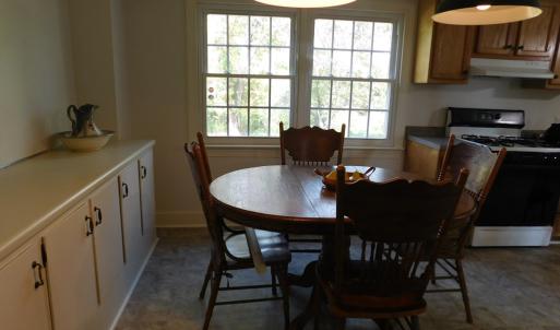 Close up of serving cabinets and breakfast area