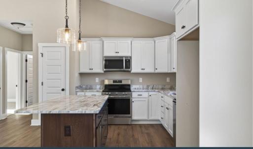Kitchen, SS Dishwasher, Microwave, and Drop In Range included