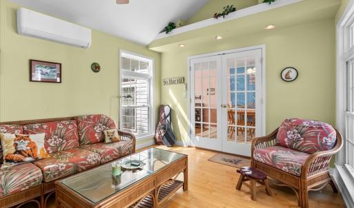 Sun Room , Separate mini-split heating and cooling keeps this room at the perfect temperature.