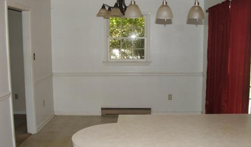 Add'l view of kitchen  showing dining area