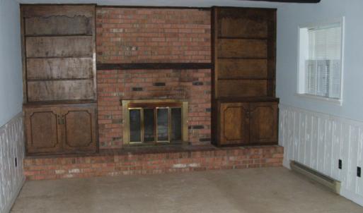 Family room on 1st level, w/gas log fireplace