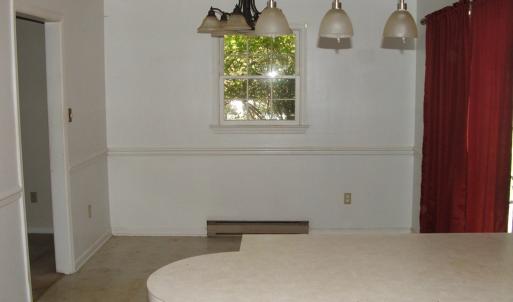 Add'l view of kitchen  showing dining area