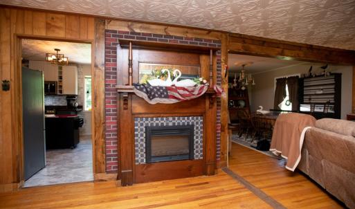 Fireplace Conveys, This electric fireplace with antique mantle