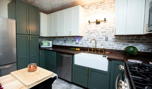 In addition to the large amount of kitchen storage there is also a pantry