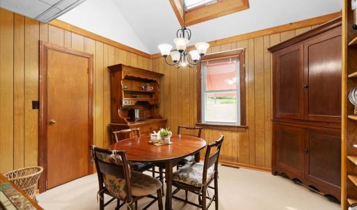 Dining Room, A skylight brings natural lighting into the dining room and the loft above.