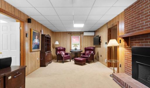 Sitting Room, This room offers space as a family den, sitting room, home office, or more.