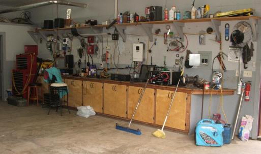 Interior of garage/shop (notice built-in cabinets)