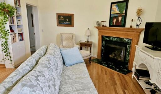 Living room with gas fireplace in addition