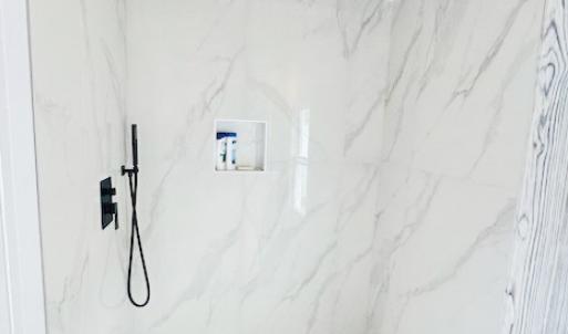 Exquisite marble and tile shower Upstairs.