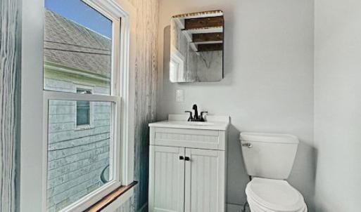 Upstairs Bathroom.  Fixtures opposite the spacious