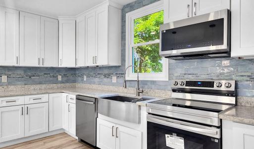 Real Wood Cabinets and SS Appliances
