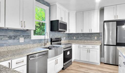 Real Wood Cabinets and SS Appliances