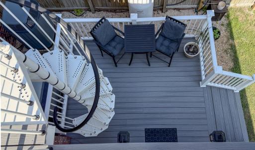 back deck leading up to balcony off of Primary ens