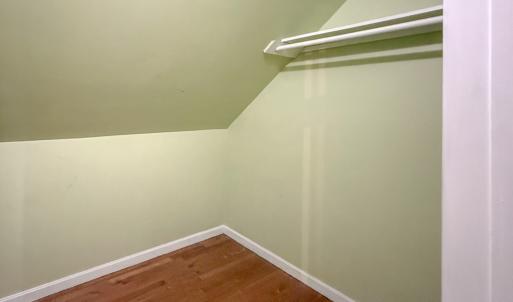 Walk in closet in upstairs hall