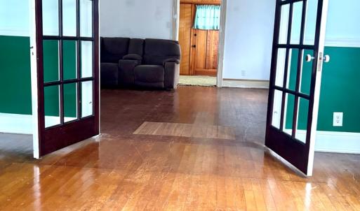 Dining room through french doors to LR