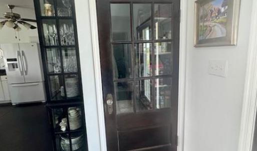 Pantry with attractive heirloom door.